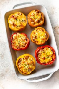 These classic ground beef and rice stuffed peppers have a tasty tomato
